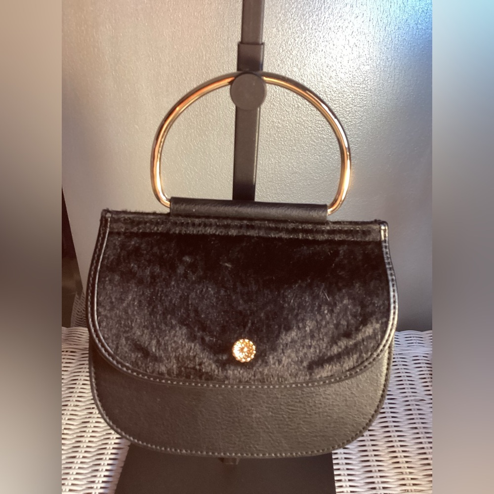 Elegant Black Mini Bag with Gold Accents